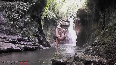 Flexible Beauty At The Waterfall - Watch4Fetish