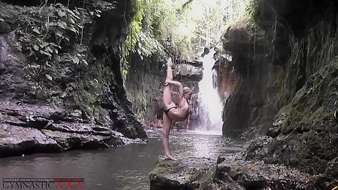 Flexible Beauty At The Waterfall - Watch4Fetish