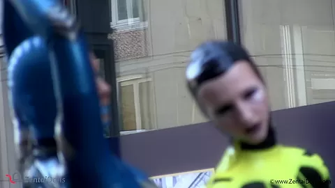 Through The City In A Tight Latex Costume - Watch4Fetish