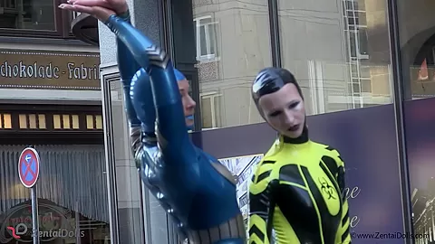 Through The City In A Tight Latex Costume - Watch4Fetish