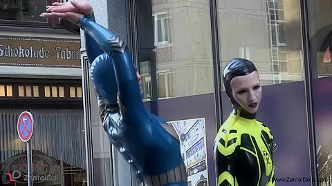 Through The City In A Tight Latex Costume - Watch4Fetish