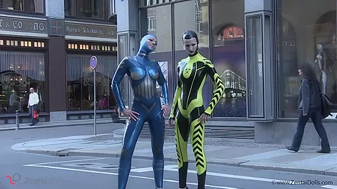 Through The City In A Tight Latex Costume - Watch4Fetish