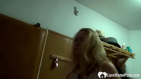 Sexy blonde fingers her self while changing