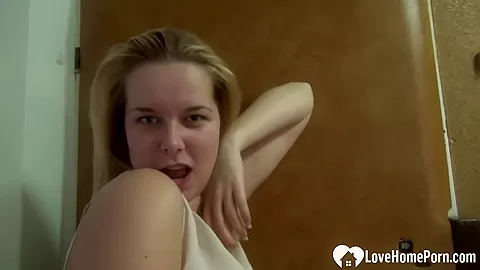 Sexy blonde fingers her self while changing