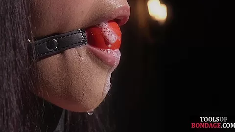 Bondage subject drooling while toyed by her bdsm maledom