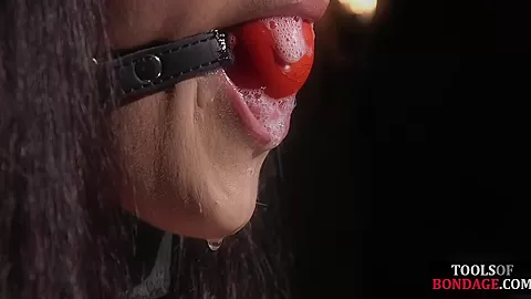 Bondage subject drooling while toyed by her bdsm maledom