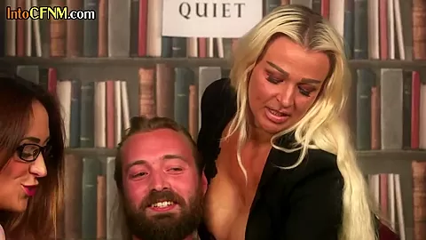 CFNM oral and handjob babes teasing hard cock in library
