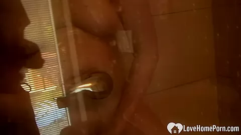 Incredible chick pleasures herself while taking a shower