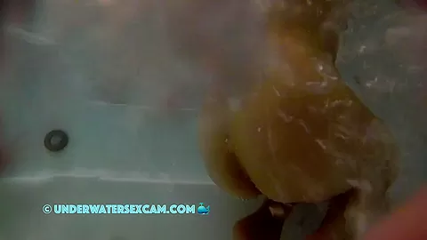 A Few Air Bubbles Find Their Way Up Between The Crack Of Her Ass