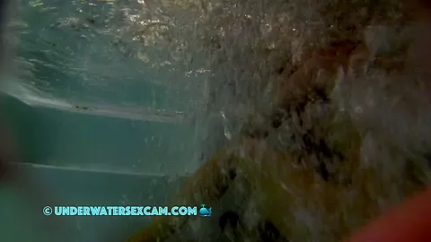 A Few Air Bubbles Find Their Way Up Between The Crack Of Her Ass