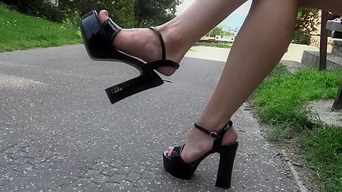 Outdoor Dangling Of Ambers Feet And Shoes While She Read A Book - SoloAustria