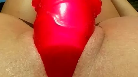 A big toy in her wet twat