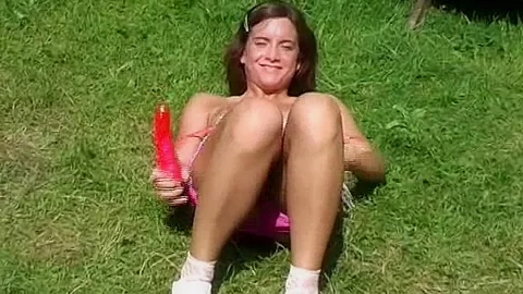 A big toy in her wet twat