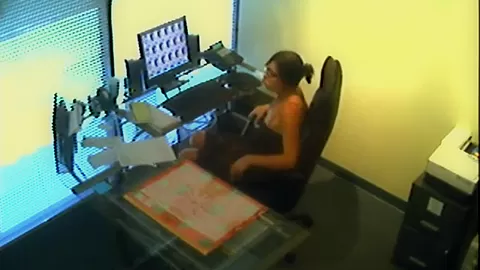 Spex slut masturbating at the office