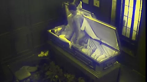 Slut fucks in massive coffin