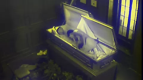 Slut fucks in massive coffin