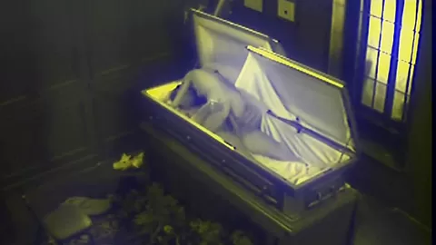 Slut fucks in massive coffin