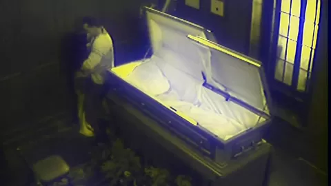 Slut fucks in massive coffin