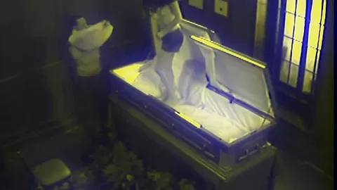 Slut fucks in massive coffin
