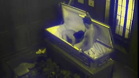 Slut fucks in massive coffin