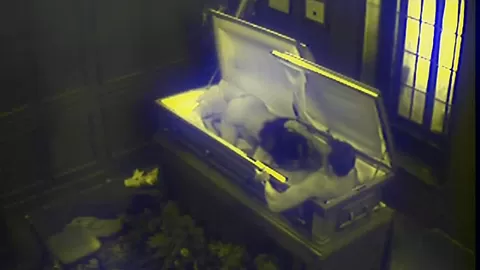 Slut fucks in massive coffin
