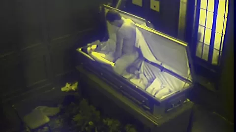 Slut fucks in massive coffin