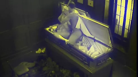 Slut fucks in massive coffin