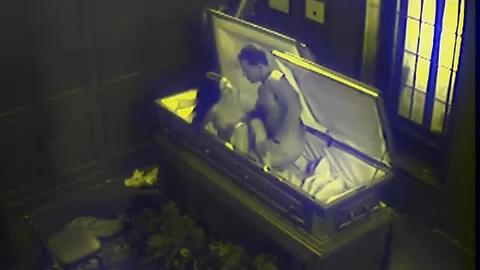 Slut fucks in massive coffin