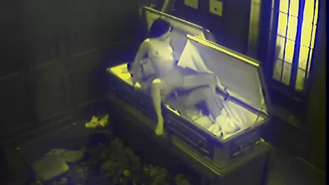 Slut fucks in massive coffin