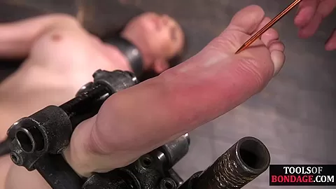 Bondage sub foot dominated in duo while in kink dungeon