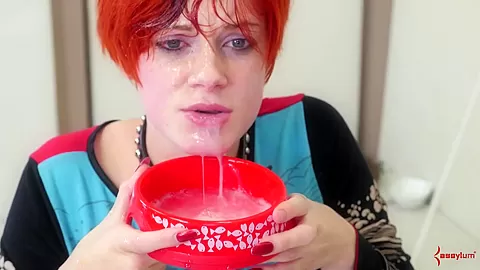 Flogged BDSM submissive drinks lube