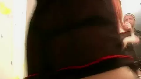 Cock sucking redhead drenched in cum