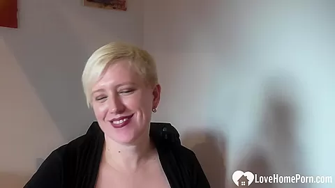 Busty blonde plays with her juicy cunt