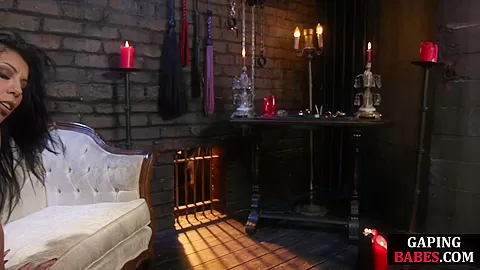 Lezdom anally penetrating bound bigass submissive in couple