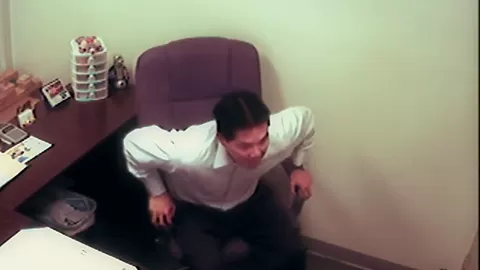 Horny slut sucking asian guy in office