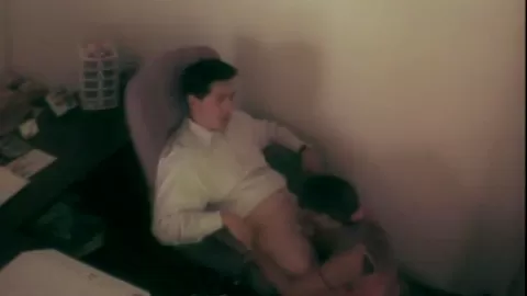 Horny slut sucking asian guy in office