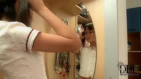 Super cute Asian Aliona dressing up in front of the camera