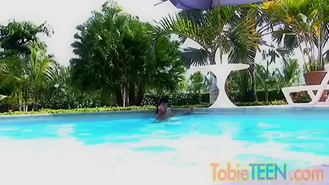 Tobie teen 18+ masturbates by the pool