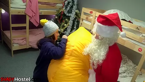 Busty Xmas sluts 3way drilled by Santa Claus in hostel room