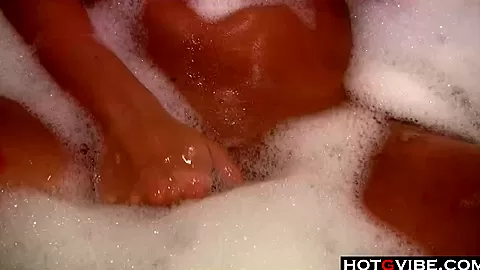 Cute Brunette in bathtub has orgasm