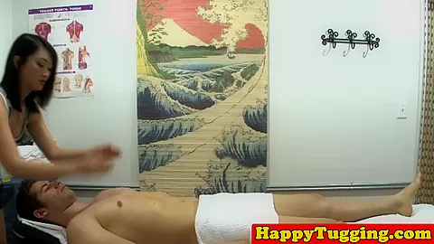 Asian masseuse cockriding and jerking
