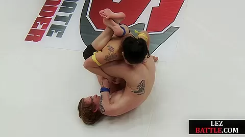 Lesbian amateur 3some wrestling on mat between hot dykes
