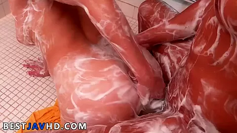 Sexy Japanese slut, Anne, gets on all fours before stud's beef whistle and gargles it hard, all while getting