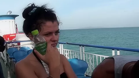 Bella in vacation porn video with a couple in a hotel room