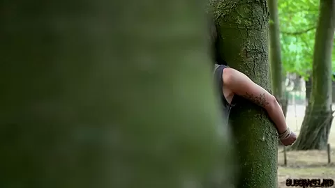 Sexy slave tied up to a tree and tortured