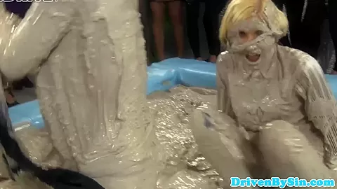 European hotties enjoy wrestling in mud