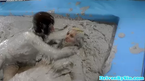 European hotties enjoy wrestling in mud