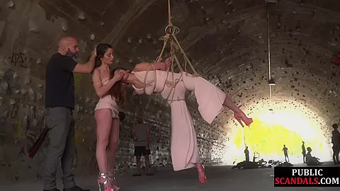 Public whipped suspension bondage slut deepthroats outdoor