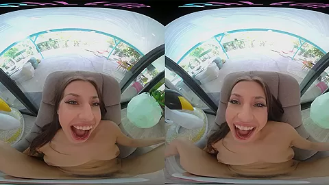 Fit brunette removes her bikini and masturbates in virtual reality