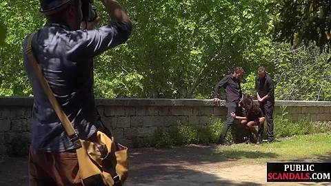 Disgraced shameless slut deepthroats in public 3some outdoor